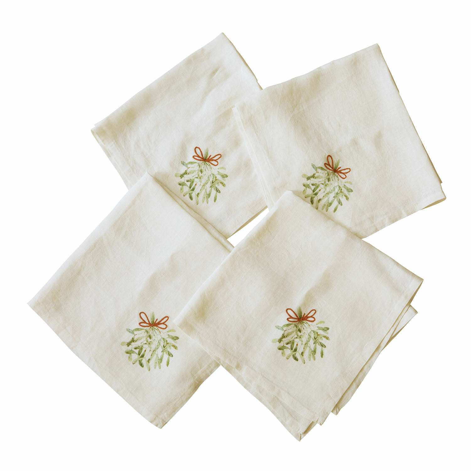 Set di 4 tovaglioli Mistletoe Set di quattro tovaglioli in lino color ecru con ricamo di vischio e fiocco rosso per la tavola
