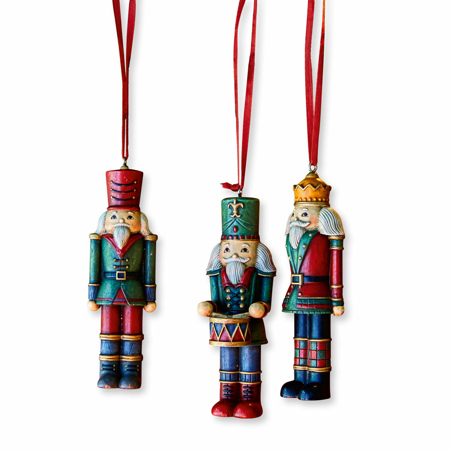 Set di 3 decorazioni da appendere Laudat Set di tre decorazioni natalizie in legno a forma di soldatini nei colori rosso e verde