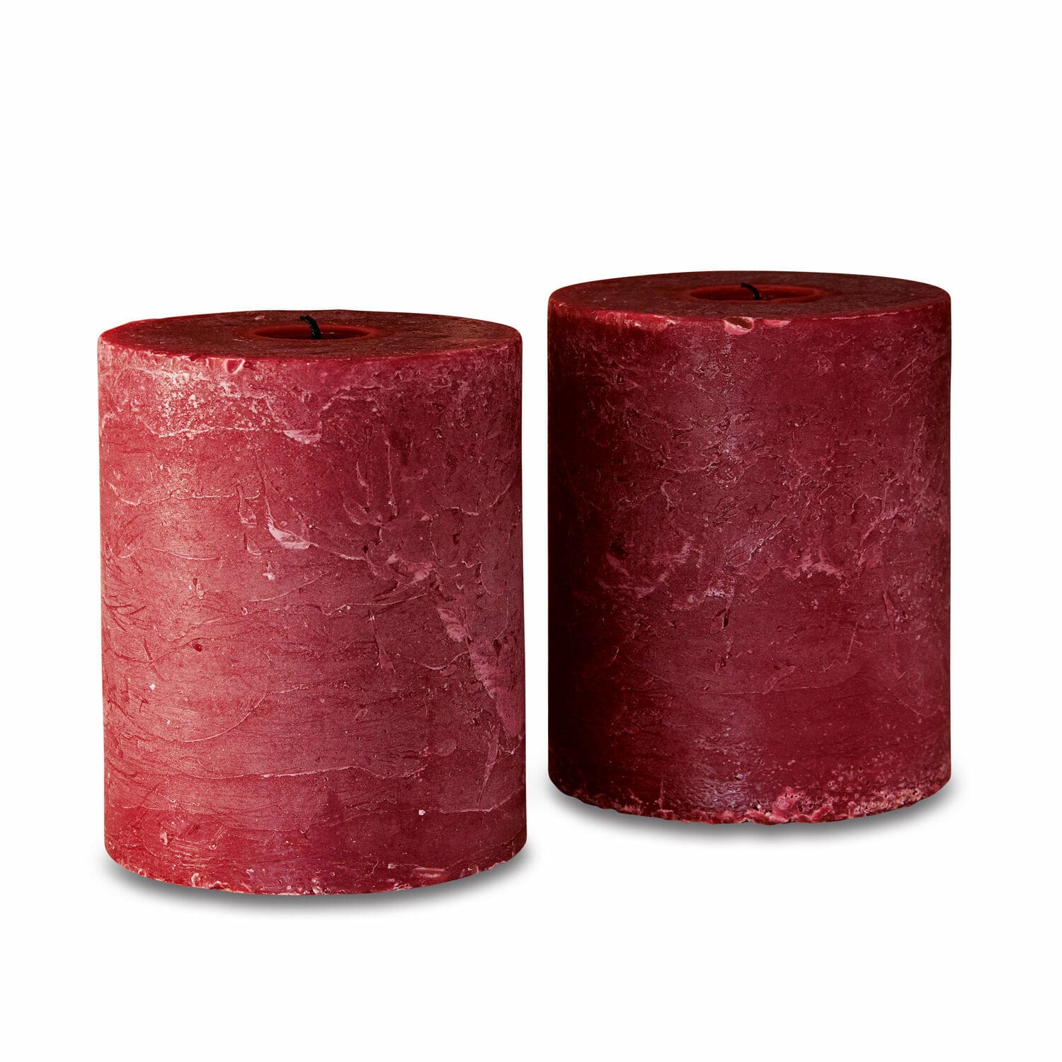 rosso Set di due candele rosse in cera con texture rustica per decorazioni d'interni