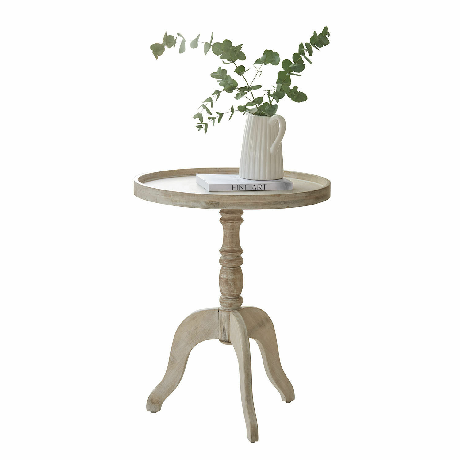 Tavolino di complemento Brookdale Tavolino rotondo in legno chiaro con brocca in ceramica e foglie verdi sopra