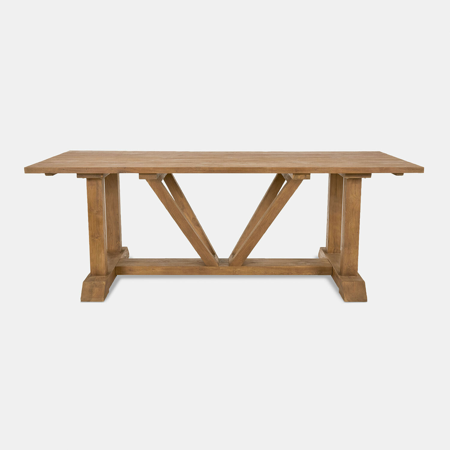 Tavolo da pranzo in legno naturale con struttura robusta e supporto decorativo a V