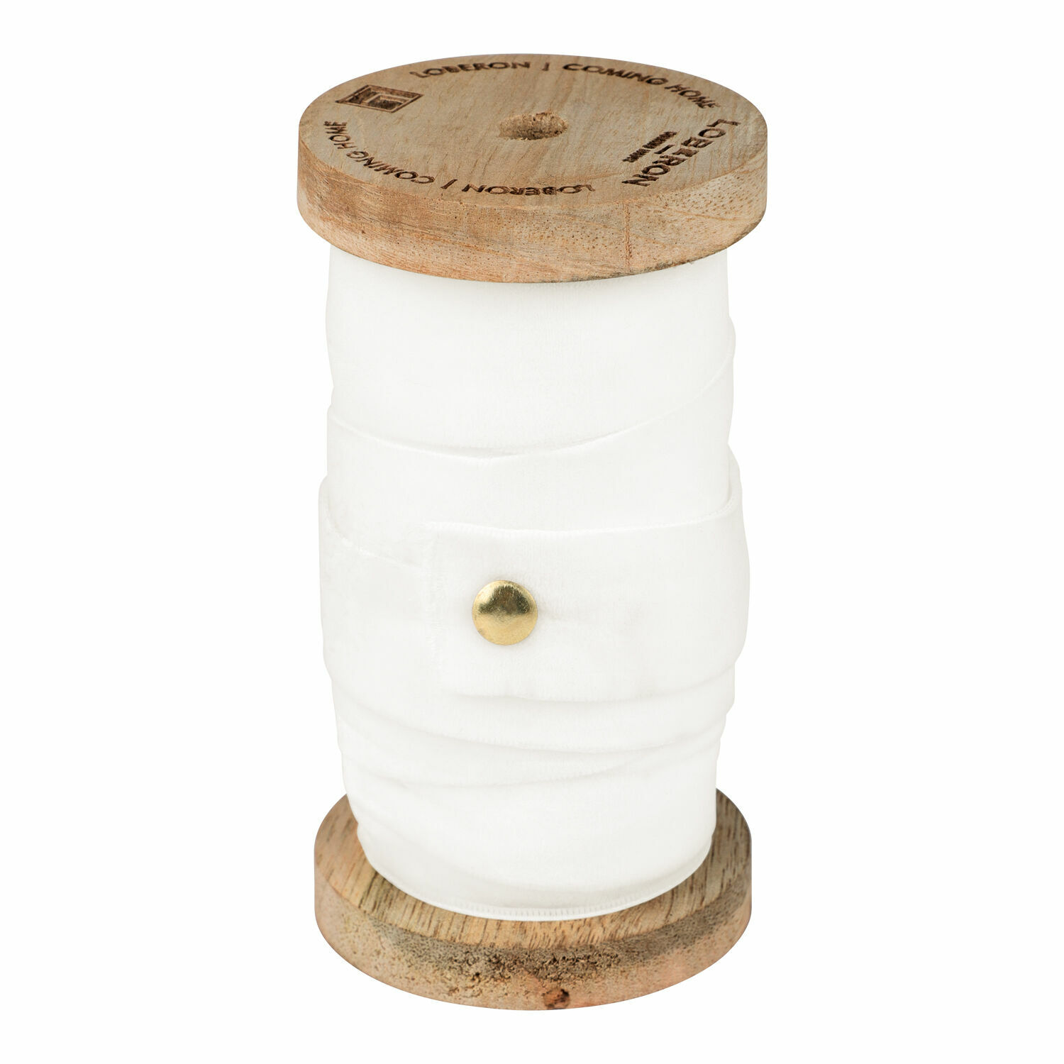 Nastro di velluto crema avvolto su rocchetto di legno per decorazioni e artigianato