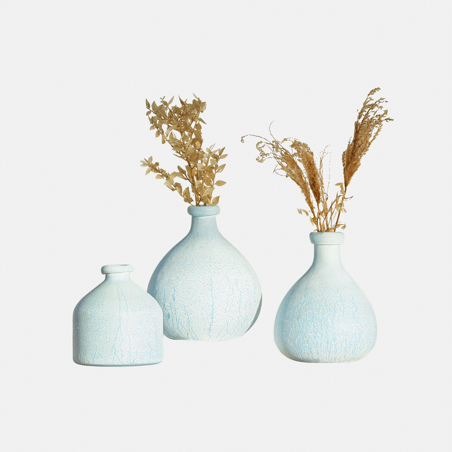 Set di 3 vasi Donara Set di tre vasi in ceramica azzurra con piante secche, decorazione elegante per interni