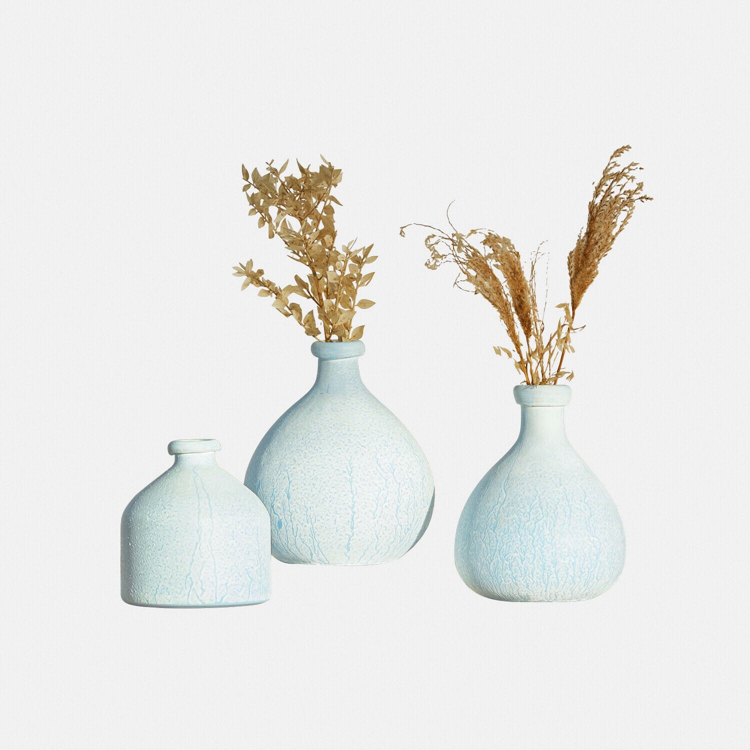 Set di 3 vasi Donara Set di tre vasi in ceramica azzurra con piante secche, decorazione elegante per interni