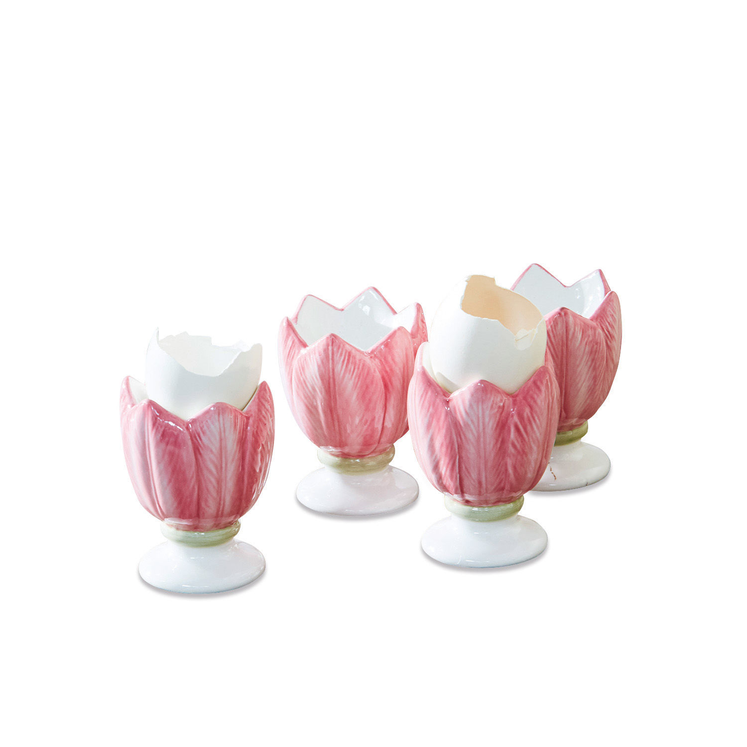 Set di 4 portauova Mireille Set di quattro portauova in ceramica rosa a forma di tulipano con gusci d'uovo bianchi