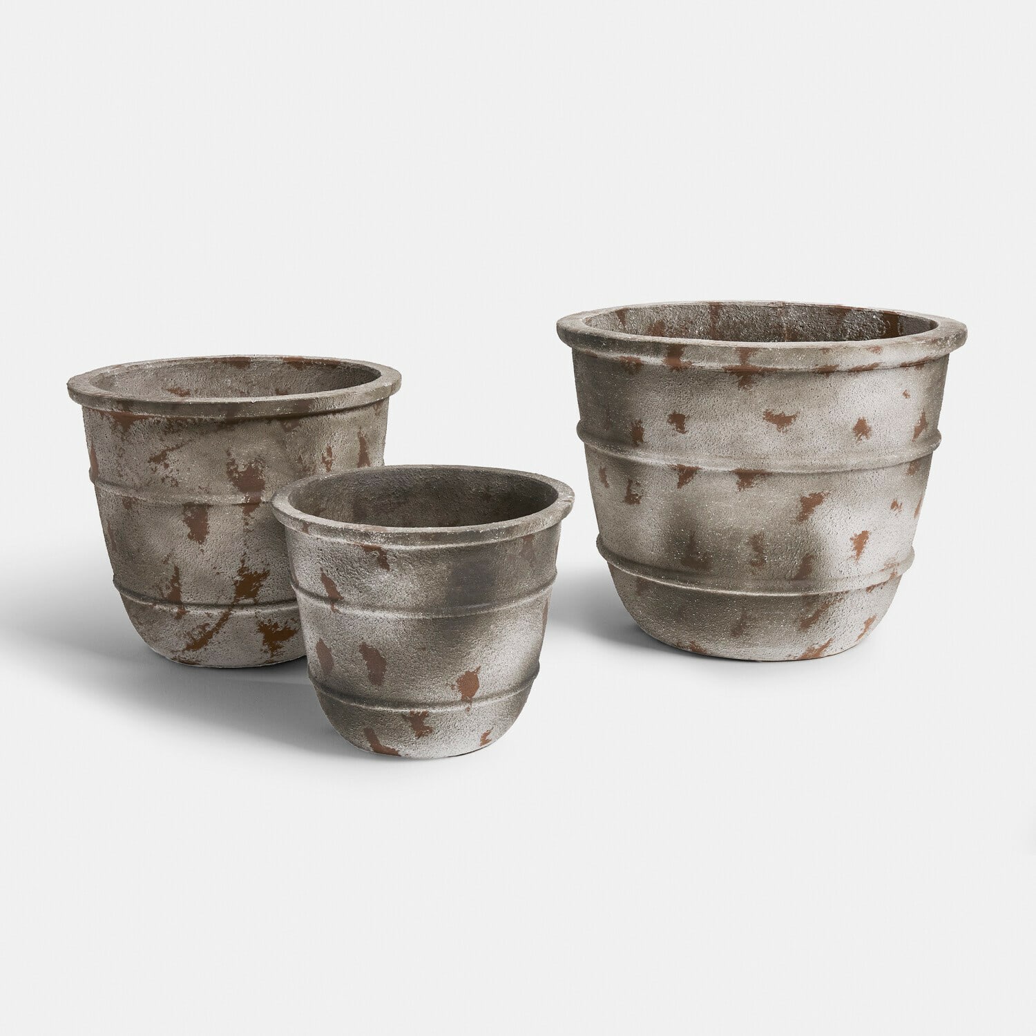 Set di 3 vasi Arlivonne Set di tre vasi in cemento grigio dallo stile rustico per giardino e interni