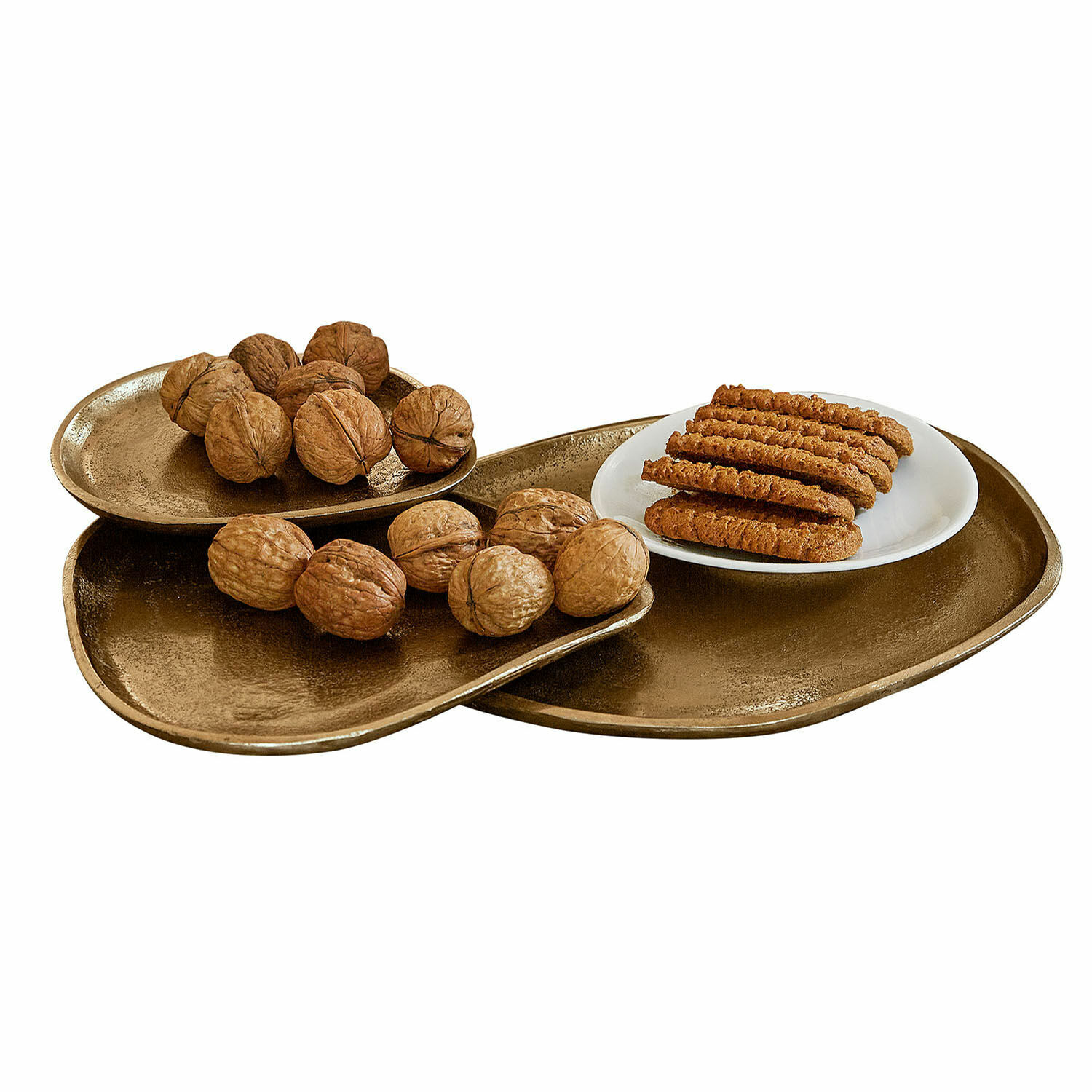 Vassoio Zampillo Set di tre vassoi in ottone dalla forma irregolare con noci e biscotti