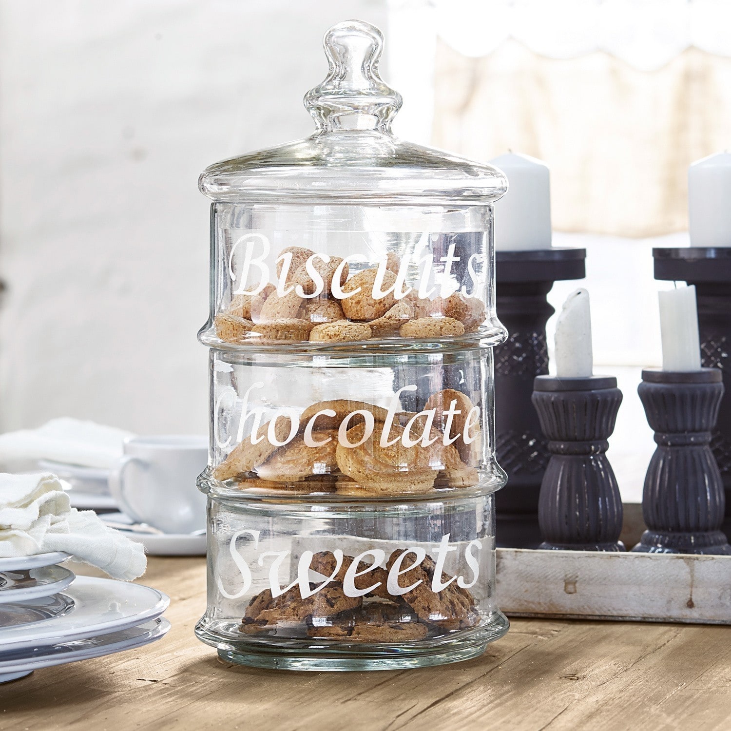 Barattolo in vetro Aletta Contenitore in vetro a tre scomparti per biscotti, cioccolato e dolci su tavolo in legno
