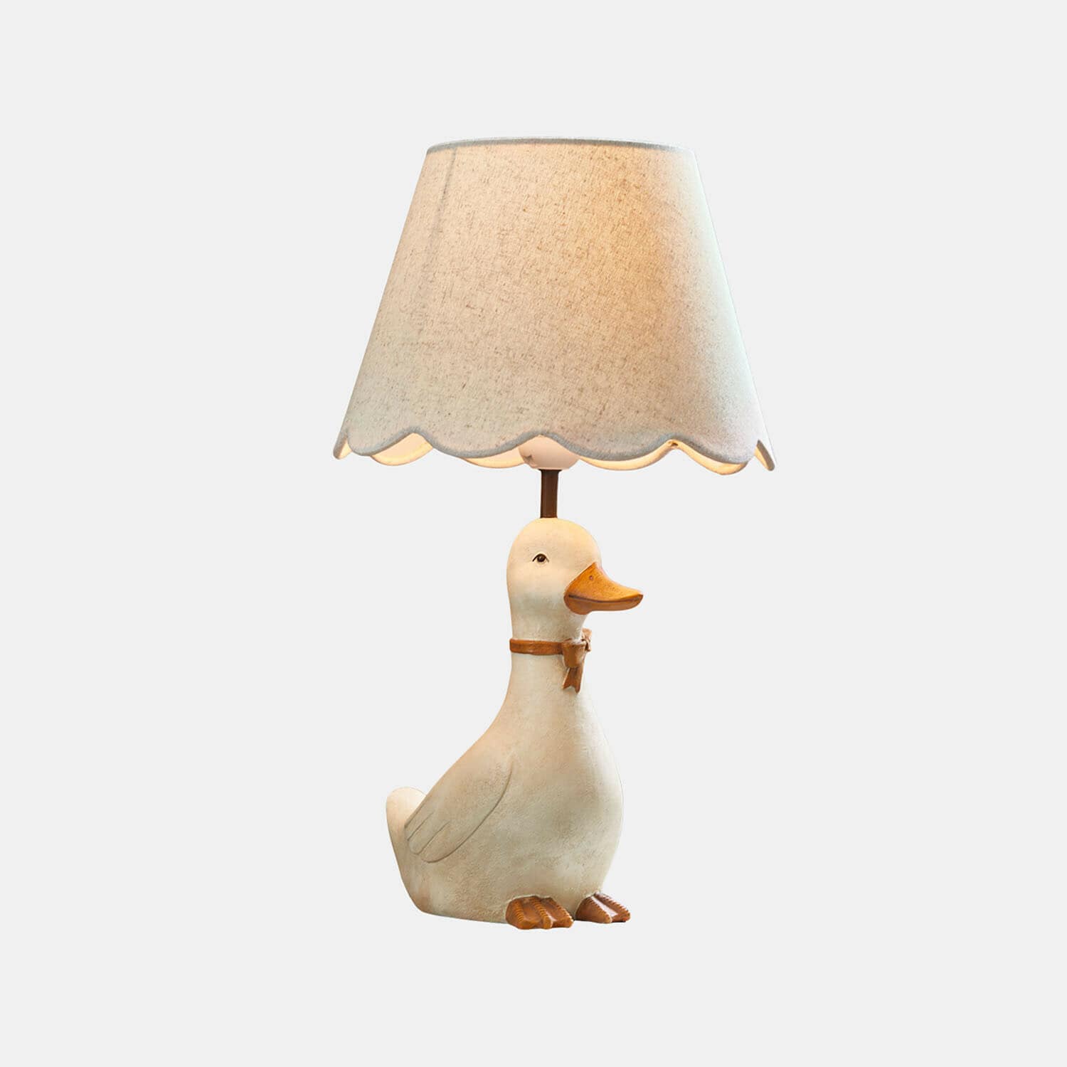 Lampada da tavolo per bambini Tillyboo Lampada da tavolo con paralume beige e base a forma di anatra bianca con becco arancione