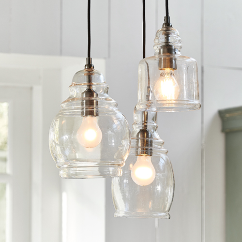 Set di tre lampade a sospensione in vetro trasparente con portalampade in metallo, illuminazione moderna