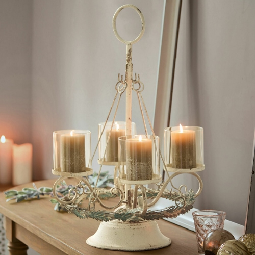 Portacandele in metallo crema con quattro candele in vetro, decorazione da tavolo