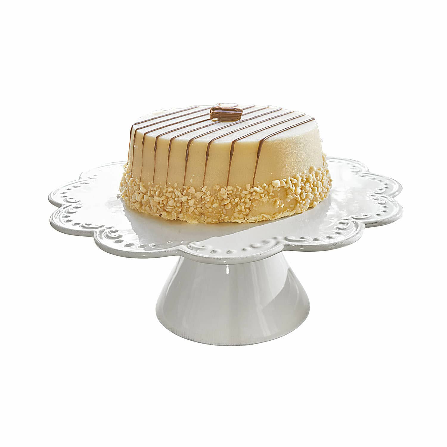 Alzata per dolci Fontienne Torta su alzata in ceramica bianca con glassa cremosa e granella di nocciole, dessert elegante