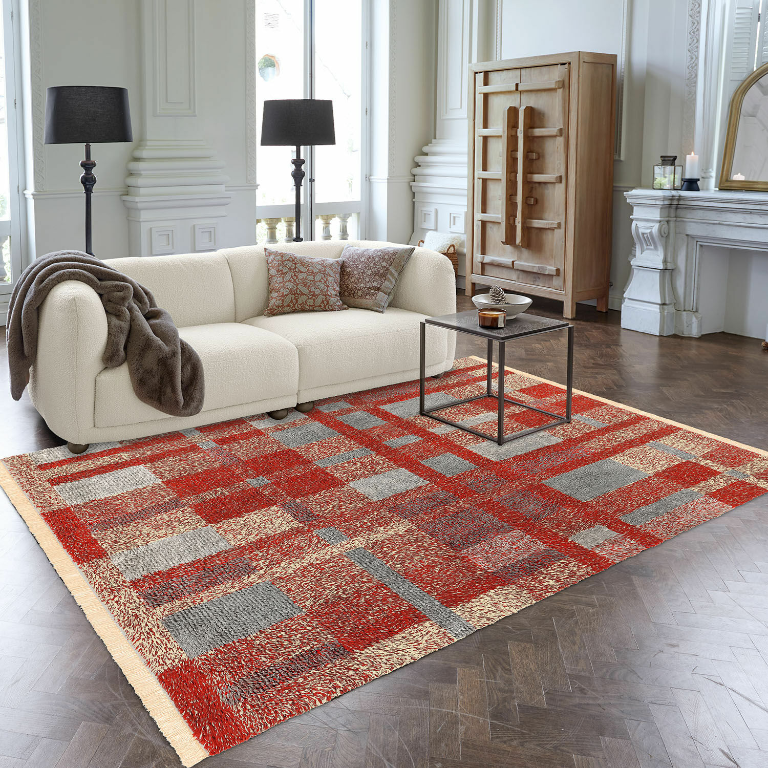 Tappeto Serenith Tappeto con motivo geometrico rosso e grigio su pavimento in legno in soggiorno moderno