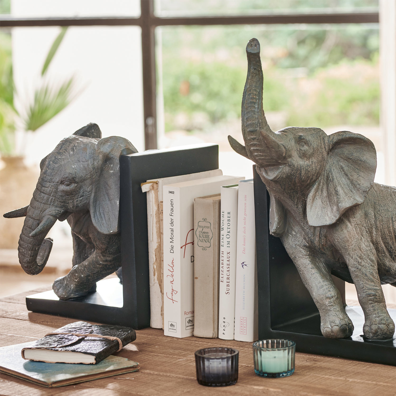 Coppia di reggilibri Elephants