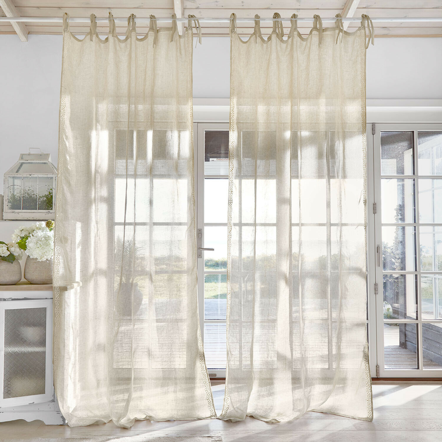 Tenda Lueur d’Aube Tende trasparenti in lino naturale che diffondono delicatamente la luce in una stanza luminosa