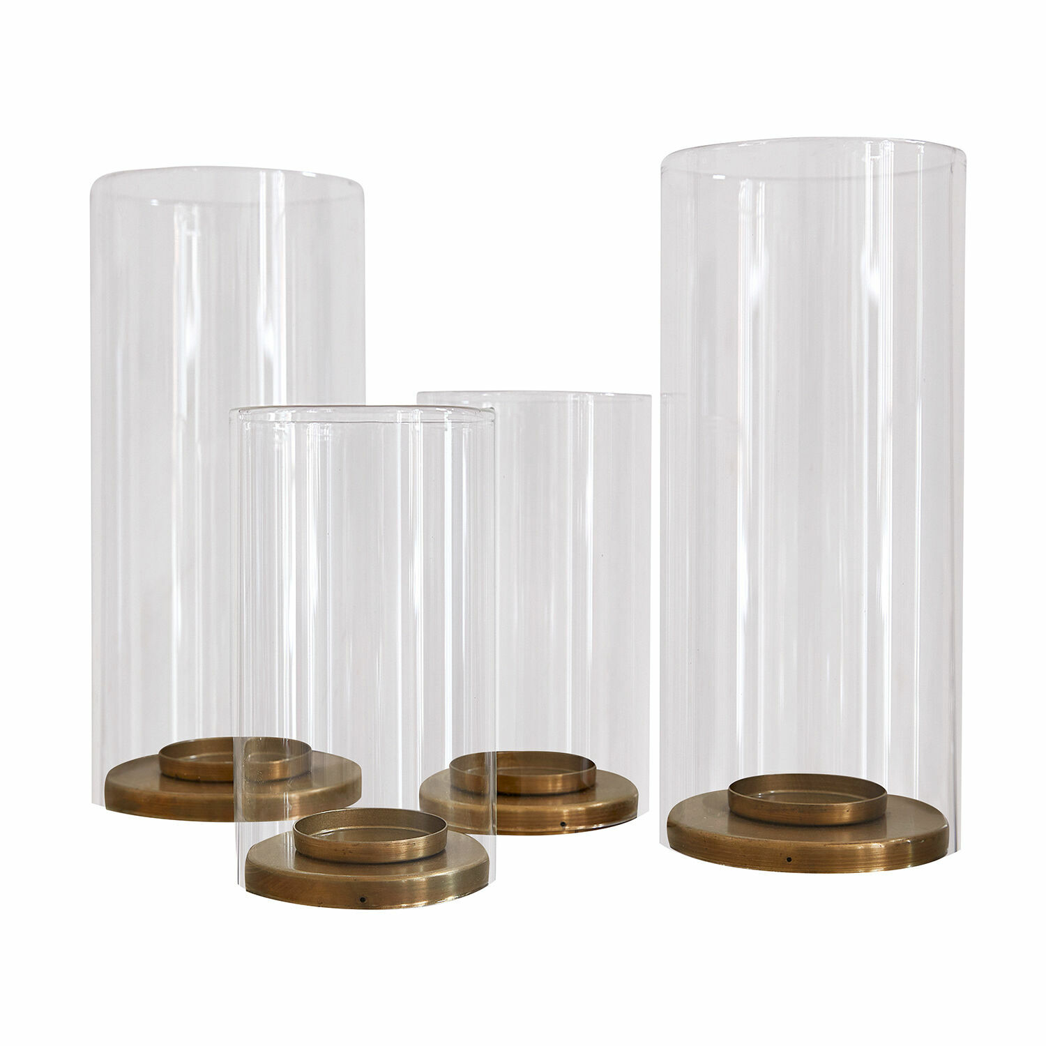Set di 4 portacandele Kriven Set di quattro lanterne in vetro trasparente con base in ottone per decorazioni d'interni