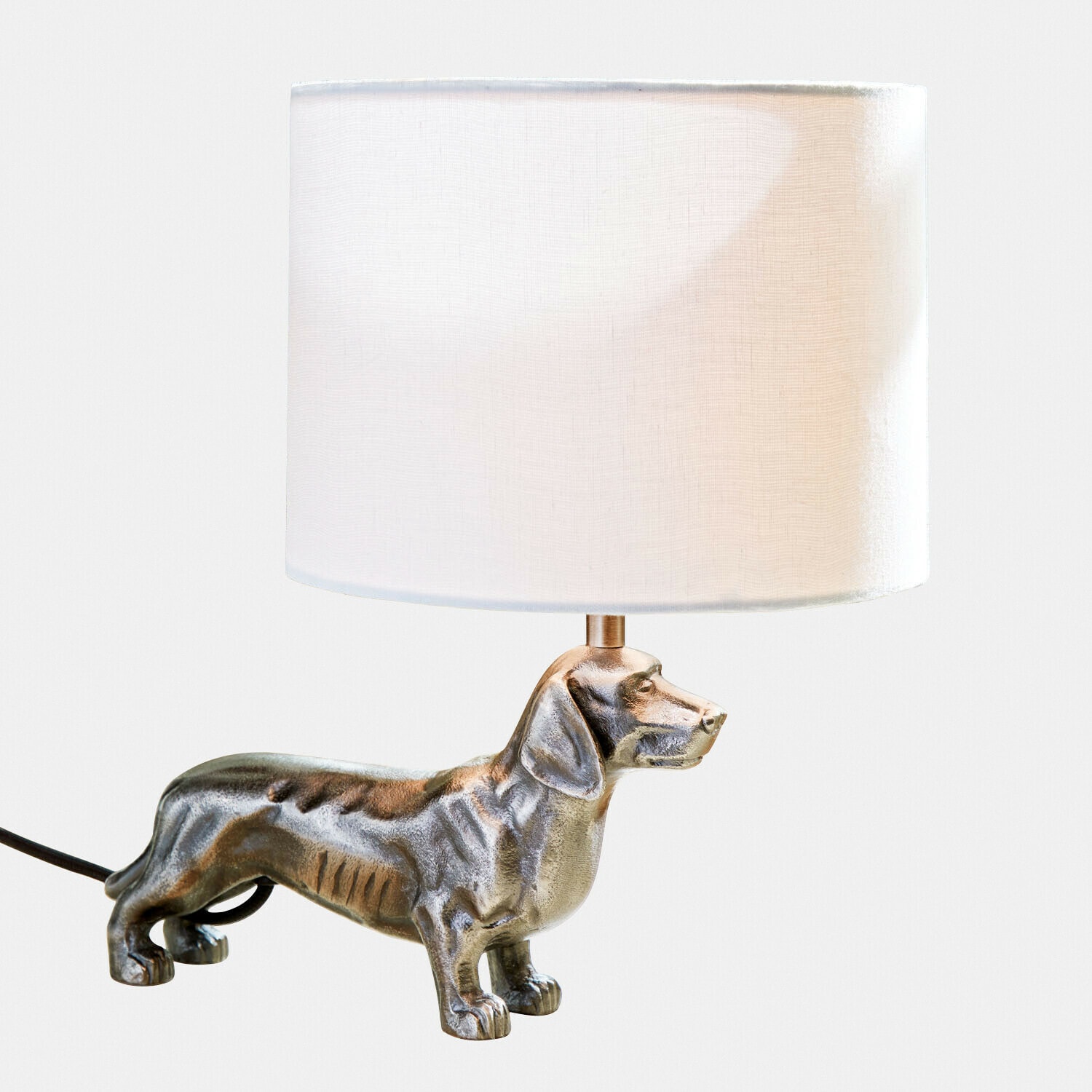 Lampada da tavolo Wendrel Lampada da tavolo con paralume bianco e base a forma di bassotto color argento
