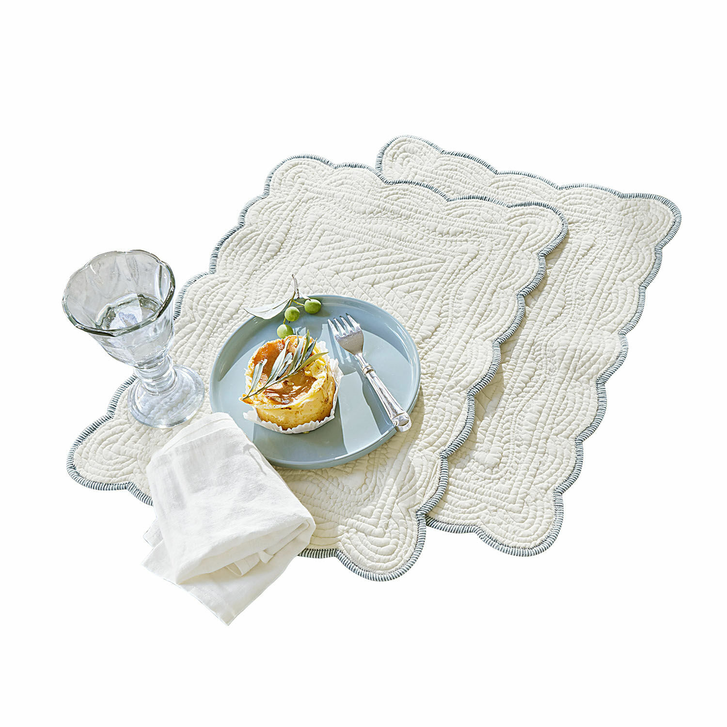 Coppia di tovagliette Fontienne Set di due tovagliette in cotone crema con trapuntatura decorativa e bordo grigio