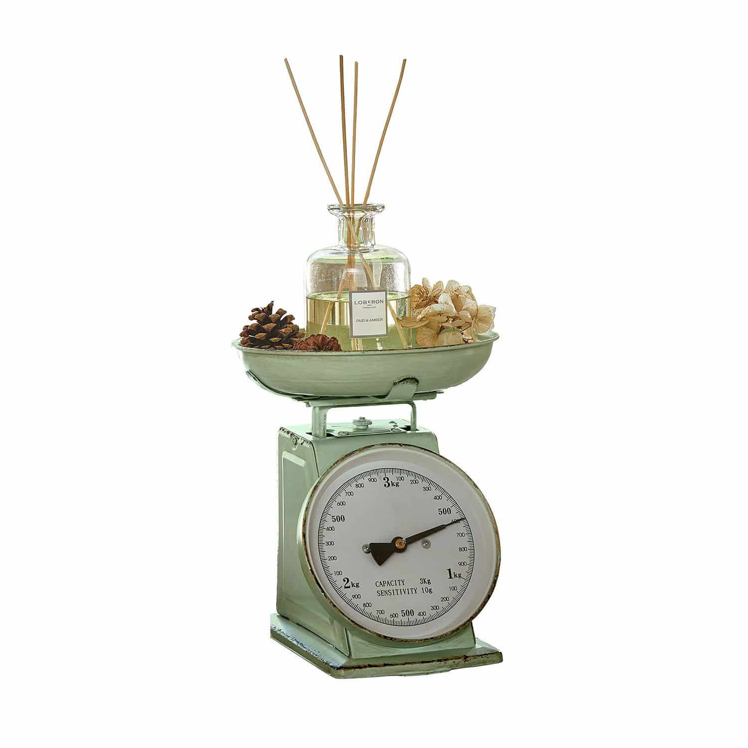 Bilancia da cucina Dorianza Bilancia da cucina verde in metallo con quadrante bianco e flacone profumato decorativo con bastoncini