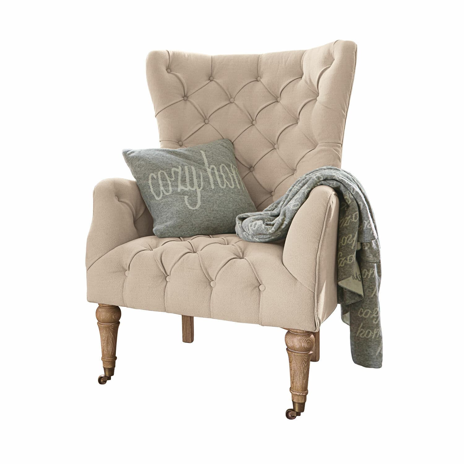 Poltrona Migré Poltrona beige imbottita con gambe in legno, cuscino e coperta grigia cozy home
