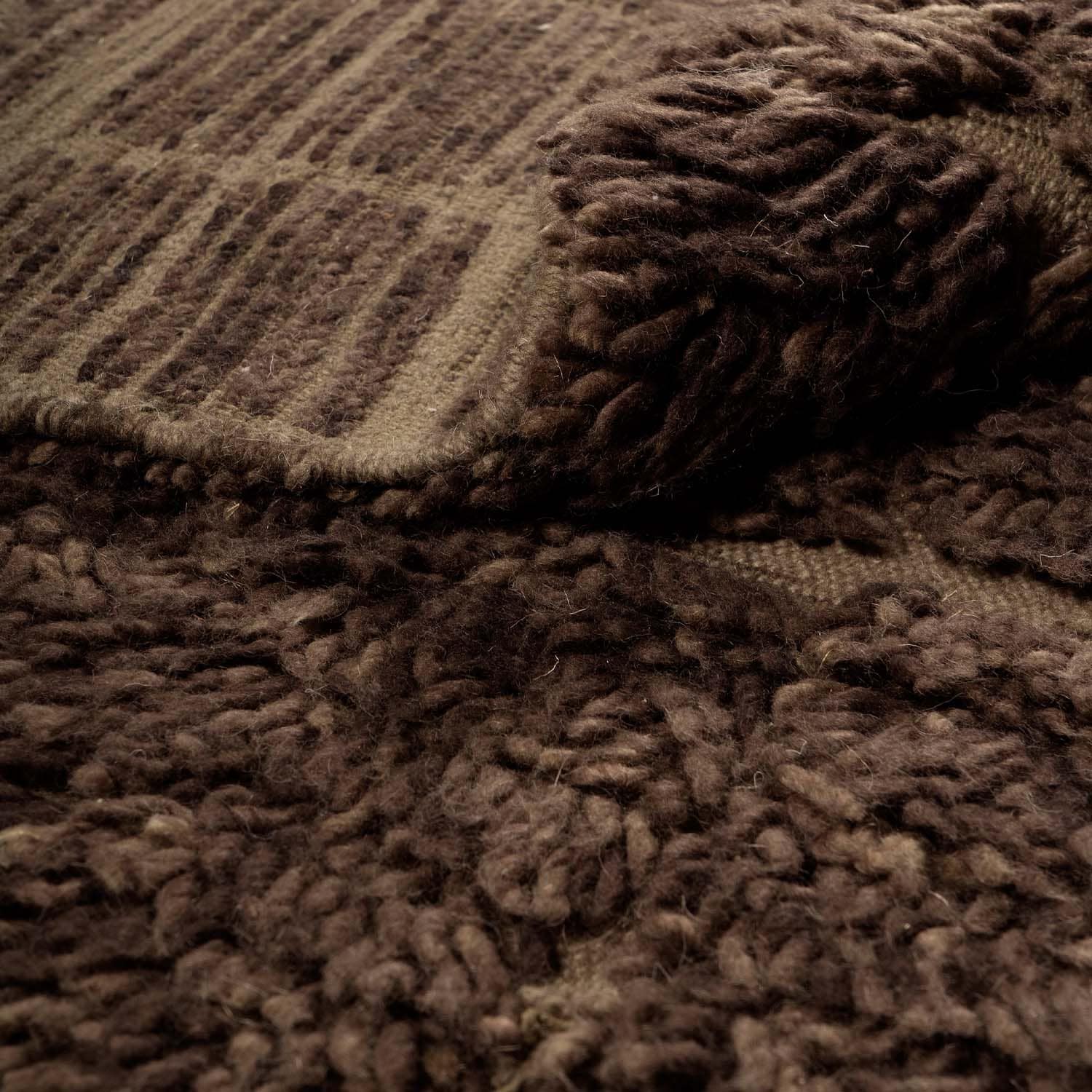 Coperta marrone in lana spessa con motivo testurizzato, perfetta per casa e relax