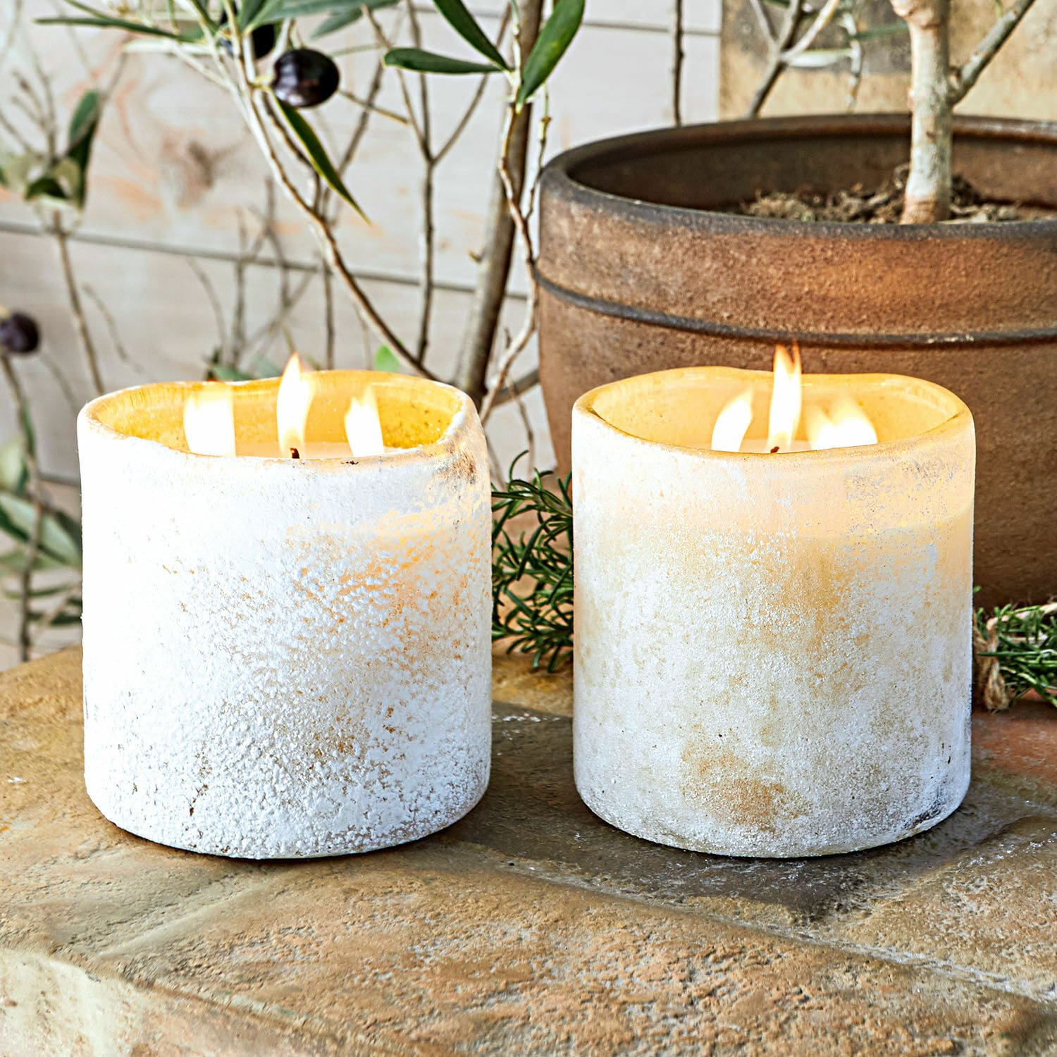 Coppia di portacandele con candele Caladia