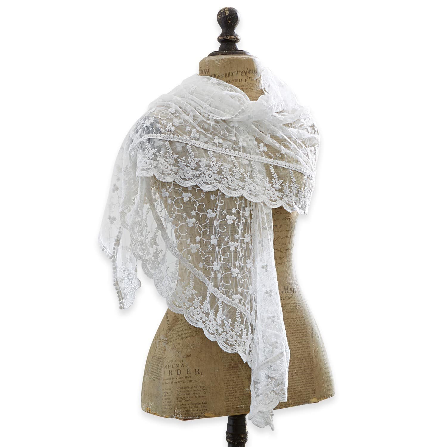 Scialle Belvéze Sciarpa in pizzo bianco con delicato motivo floreale su manichino, accessorio elegante